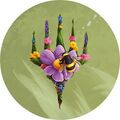 Bloomburrow symbol based on flower garden.